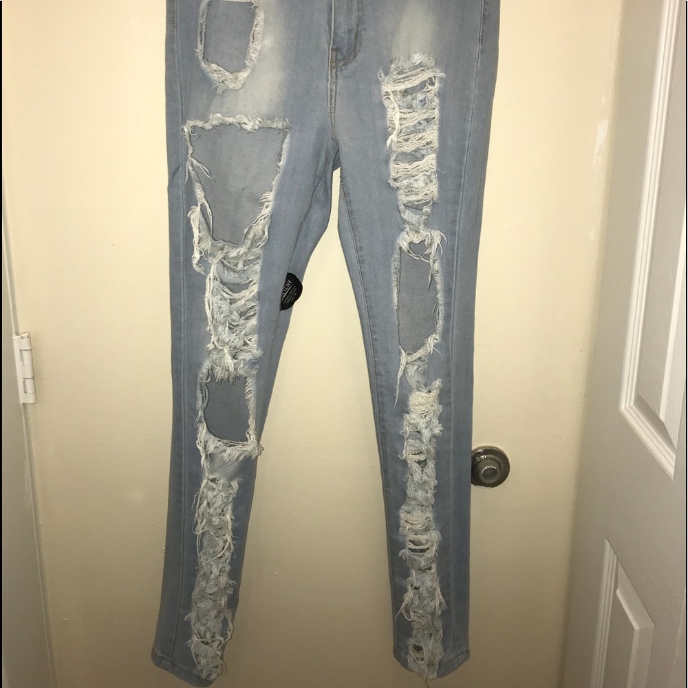 Sky blue ripped jeans